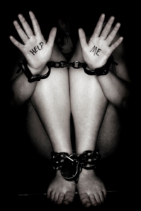 Hands and feet in Chains from iStockPhoto